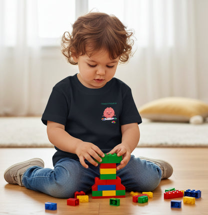 Black t-shirt with a small brain playing with building blocks graphic on a wooden floor