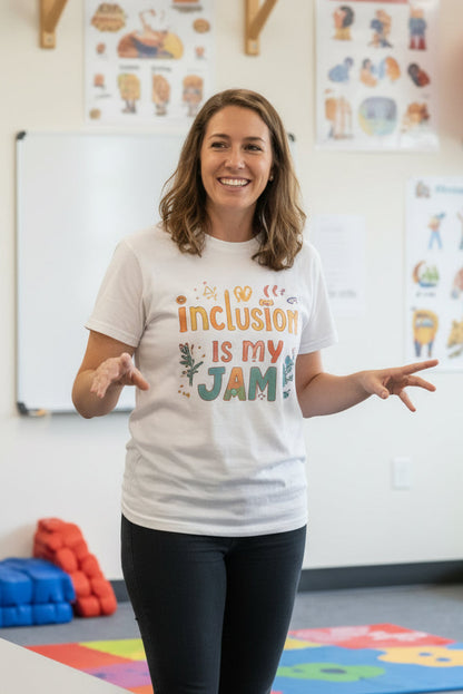Woman wearing a 'Inclusion is my Jam' t-shirt in a classroom setting