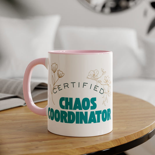 Mug with 'Certified Chaos Coordinator' text on a wooden table