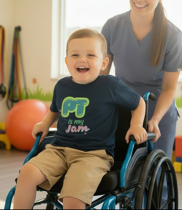 Navy blue t-shirt with colorful text design PT is my Jam' on a young boy coming out of his wheelchair with his physio