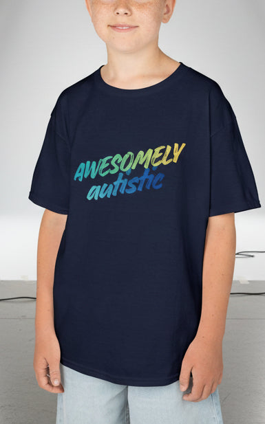 Child wearing a navy blue t-shirt with 'AWESOMELY autistic' text on a white background